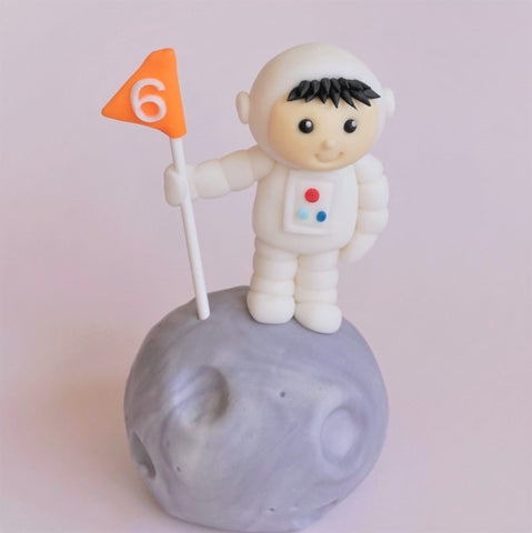 Fondant astronaut on a moon cake topper