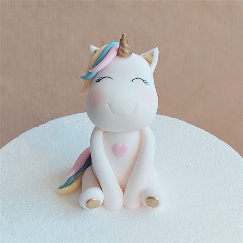 Fondant unicorn cake topper