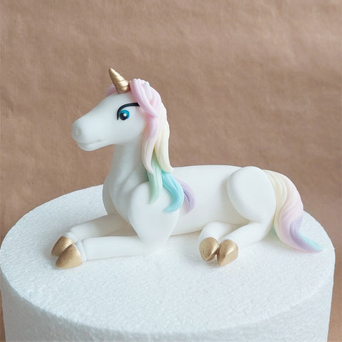 Fondant pastel unicorn cake topper