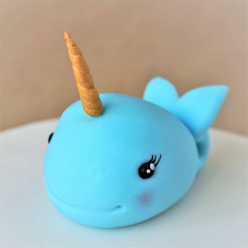 Fondant narwhal cake topper