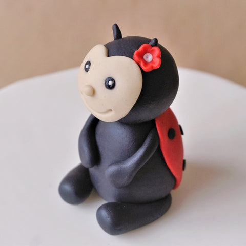 Fondant ladybug cake topper