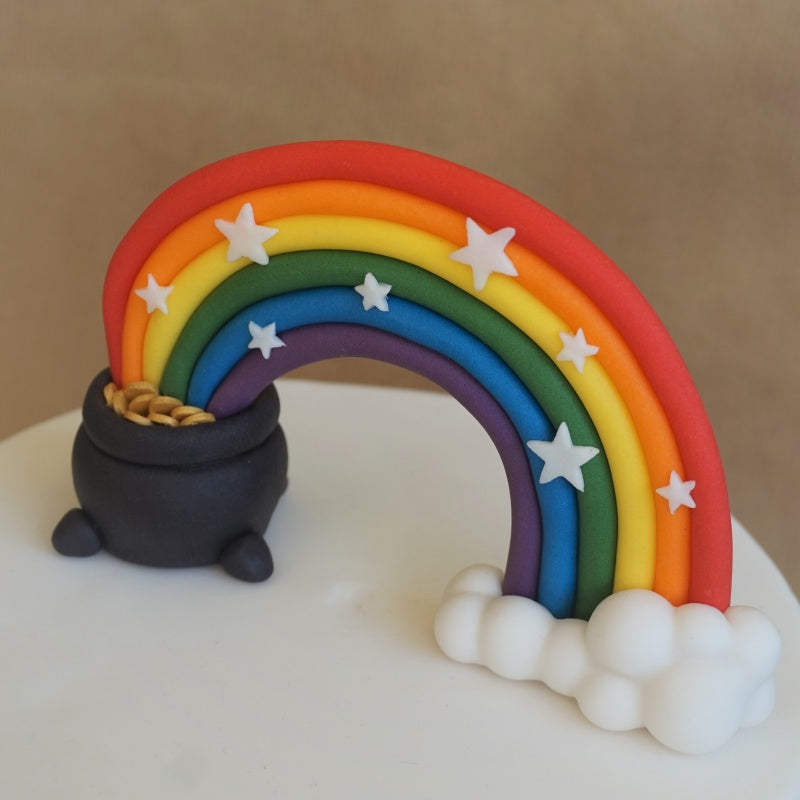 Fondant rainbow cake topper with a pot of gold