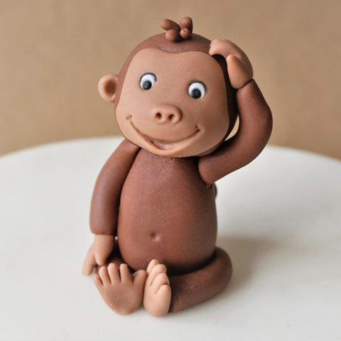 Fondant monkey cake topper