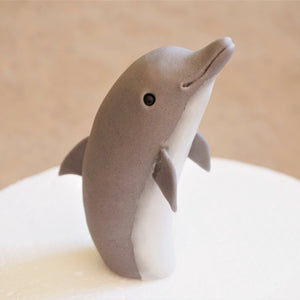 Fondant dolphin cake topper