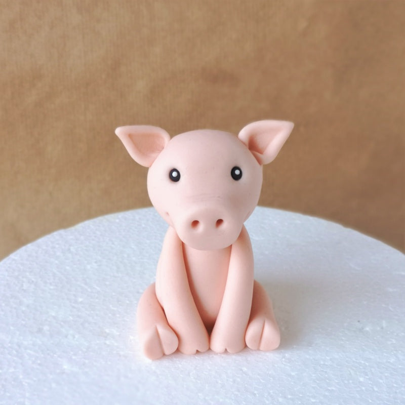 Fondant pig cake topper