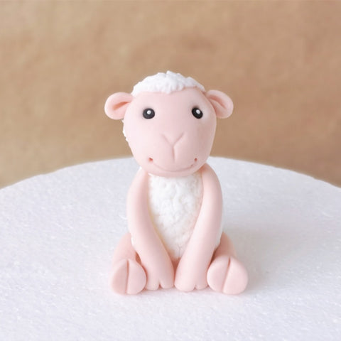 Fondant sheep cake topper